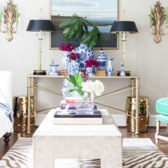 Front Room, Family Room, Modern Chic, Zebra Rug, Tufted Sofa, brass, concrete table