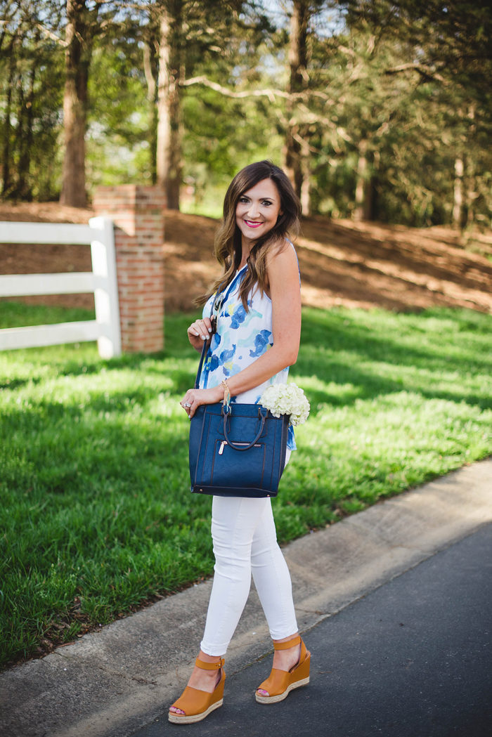 This fun look with Charming Charlie is easy to dress up and down.This fun floral top, navy cross body and trendy wedges from Charming Charlie make for a great Spring outfit. 