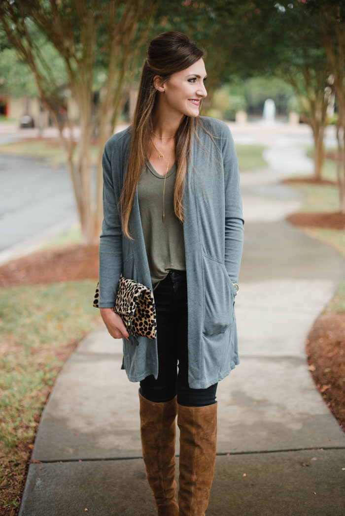 Blogger Mallory Fitzsimmons of Style Your Senses shows how to wear simple layers like a long cardigan and over the knee boots for a casual Fall look.